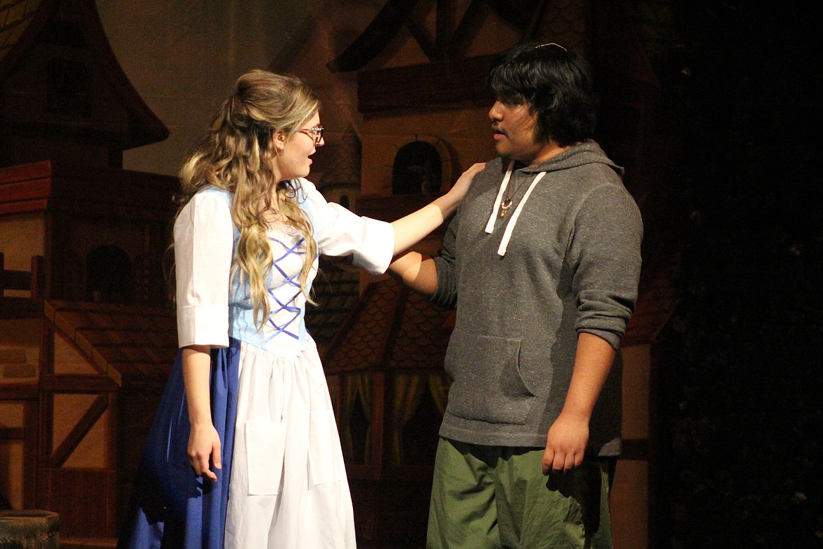 Belle (Hailey Beegle), left, and her father Maurice (Abraham Santiago), right, reassure each other they’re just fine. Quincy High School’s production of “Beauty and the Beast” opens Friday.