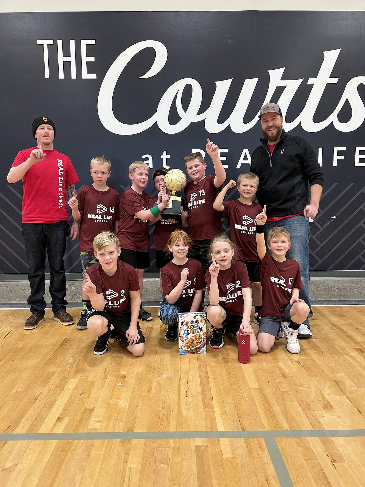 Courtesy photo
The Warriors won the 3rd/4th grade basketball championship at Real Life Sports. In the front row from left are Jackson Wirth, Faryn Dahl, Lucy Hancock and Lincoln Schlenker; and back row from left, coach James, Westley Deal, Bryce Van Leauven, Jesse Ellars, Tyson Phillips, Winston Deal, and coach Chris Deal.