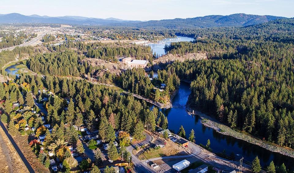 Drone photo of the Spokane River in Post Falls looking east. Portions of the wooded areas could be included in Large Tracts Program agreements through Idaho Department of Fish and Game, which could allow some hunting and public access on otherwise privately owned timber forests. Go to IDFG.Idaho.gov to view interactive maps and more details on the program.