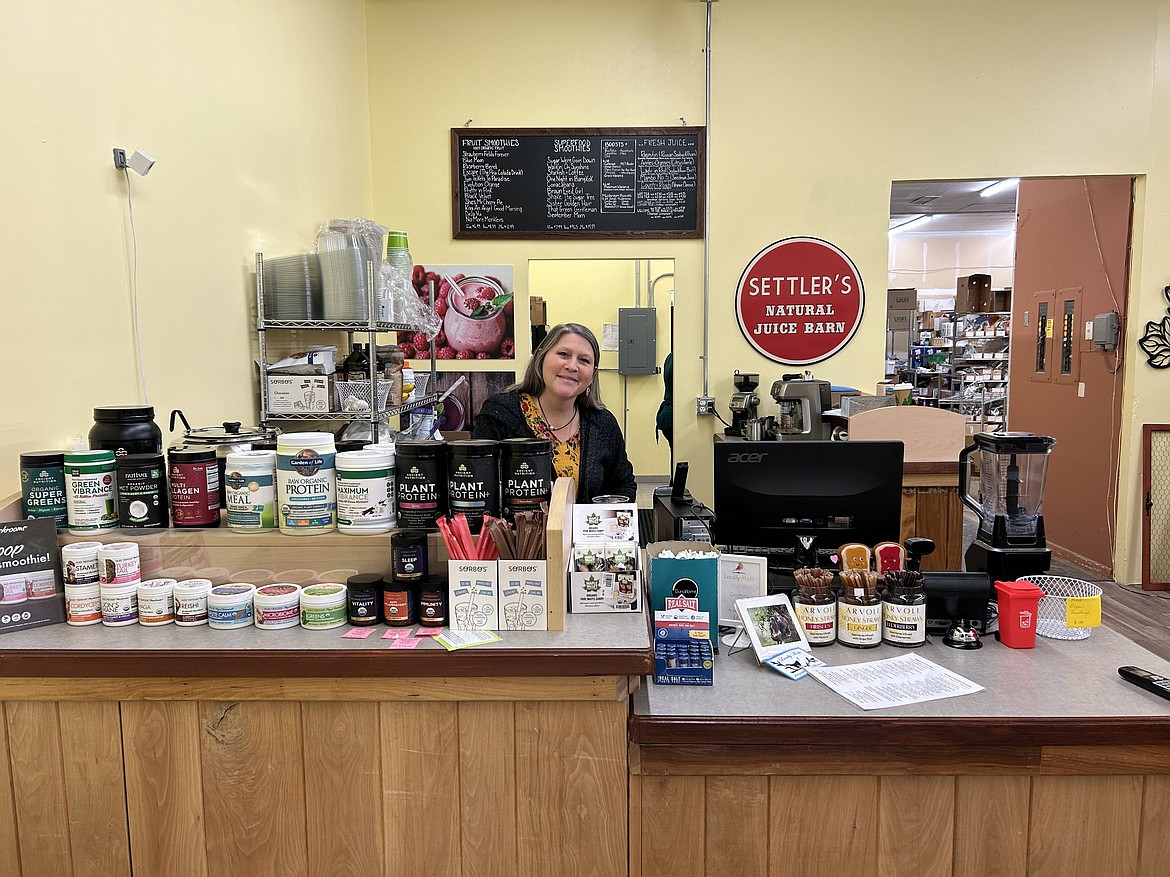 Store Operations Manager Danette Preston stands at Settler's Natural Market's smoothie bar inside the store's Moses Lake location. Preston said the goal is to provide area residents with a variety of healthy options for their dietary needs.