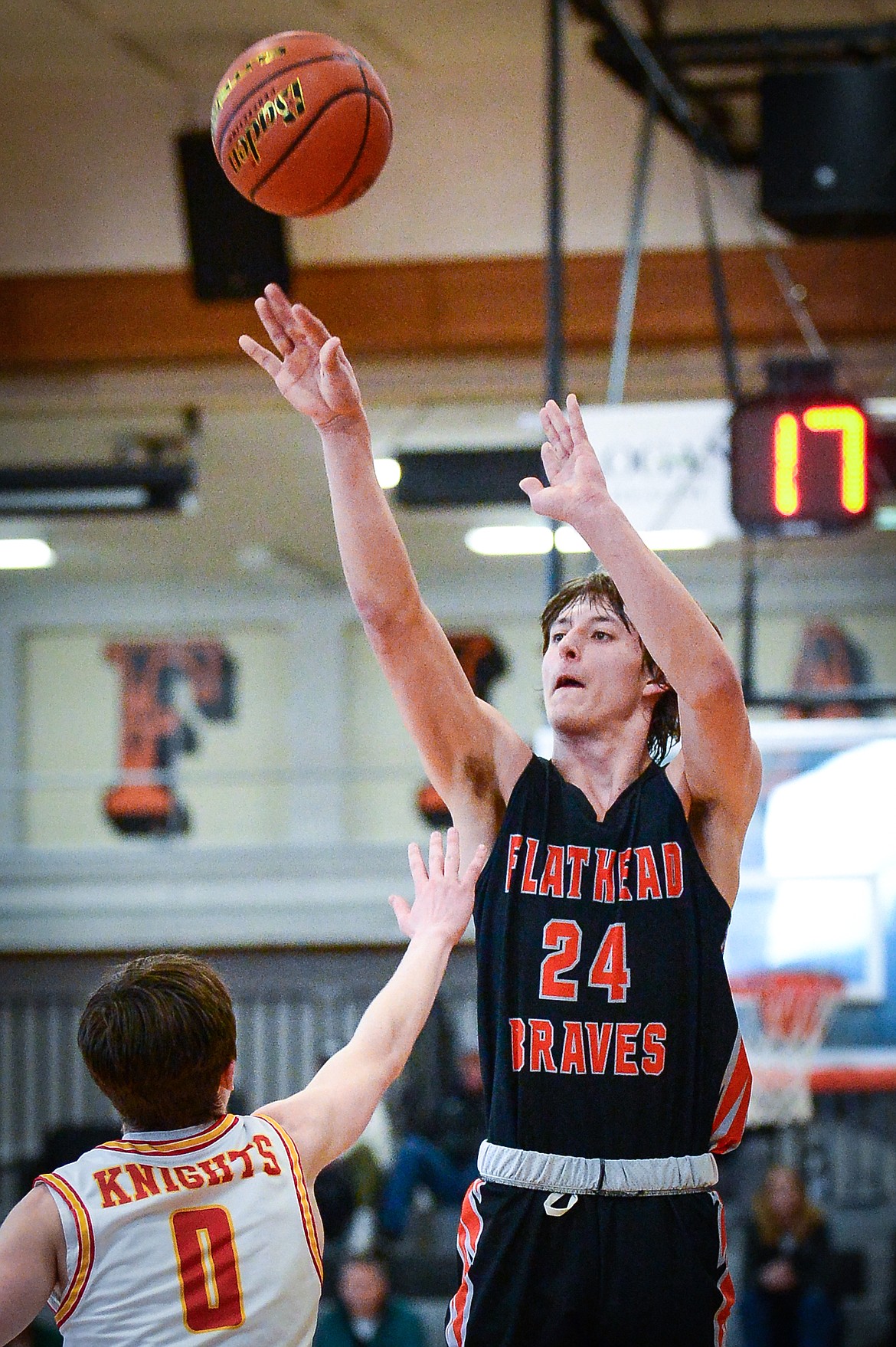 Flathead's Lyric Ersland (24) looks to shoot in the fourth quarter against Missoula Hellgate during the Western AA Divisional Tournament at Flathead High School on Thursday, March 2. (Casey Kreider/Daily Inter Lake)