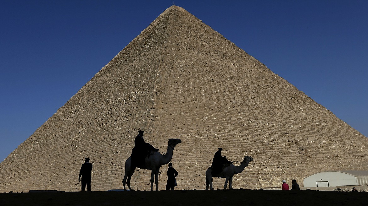 - Policemen are silhouetted against the Great Pyramid in Giza, Egypt, Dec 12, 2012. Egypt unveiled on Thursday, March 2, 2023, the discovery of a 9-meter-long chamber inside the Great Pyramid of Giza, the first to be found on the structure’s north side. (AP Photo/Hassan Ammar, File)