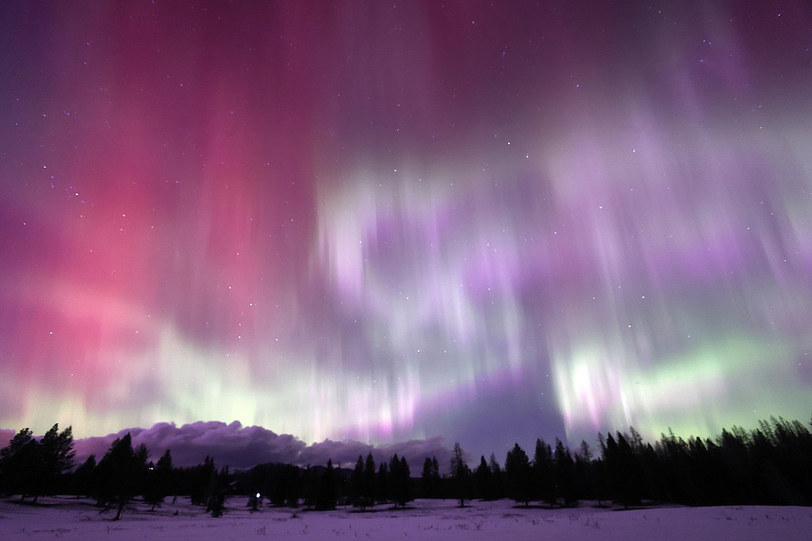 The aurora fills the skies above the mountains near Whitefish Sunday, Feb. 26. (Jeremy Weber/Daily Inter Lake)