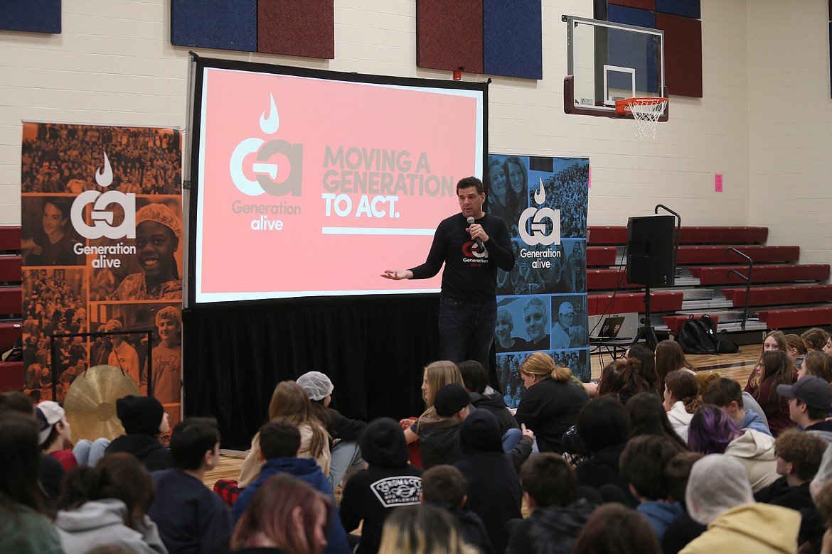 Generation Alive Program Director Darrin Duty speaks to Lakes Middle School students Thursday morning about compassion, community service and helping those who are faced with food insecurity.