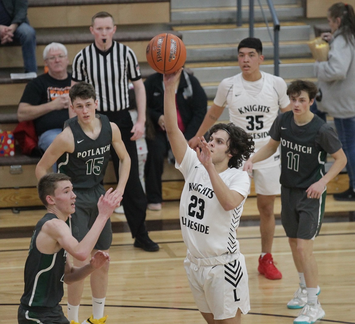 MARK NELKE/Press
Lakeside junior Liam Hendrickx puts up a shot in traffic during the second half Thursday vs. Potlatch in a state 1A Division I boys basketball first-round game at Vallivue High in Caldwell.