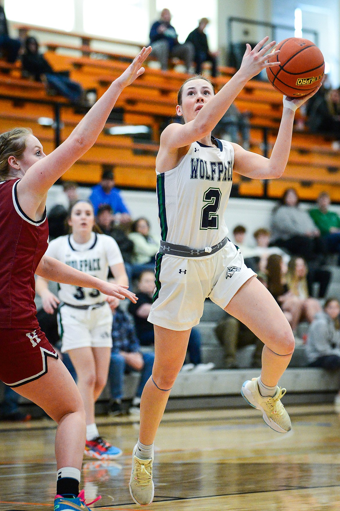 Glacier's Sarah Downs (2) looks to shoot in the first half against Helena during the Western AA Divisional Tournament at Flathead High School on Friday, March 3. (Casey Kreider/Daily Inter Lake)