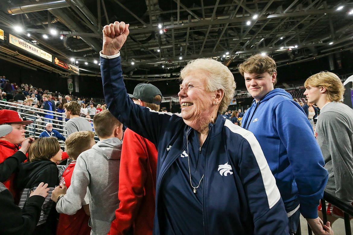 JASON DUCHOW PHOTOGRAPHY
Gay Winger, mother of Lake City High boys basketball coach Jim Winger, celebrates after the Timberwolves' 58-49 win over Madison of Rexburg in the state 5A semifinals at the Ford Idaho Center in Nampa on Friday. Lake City will face Meridian in the championship game tonight at 7 PST.