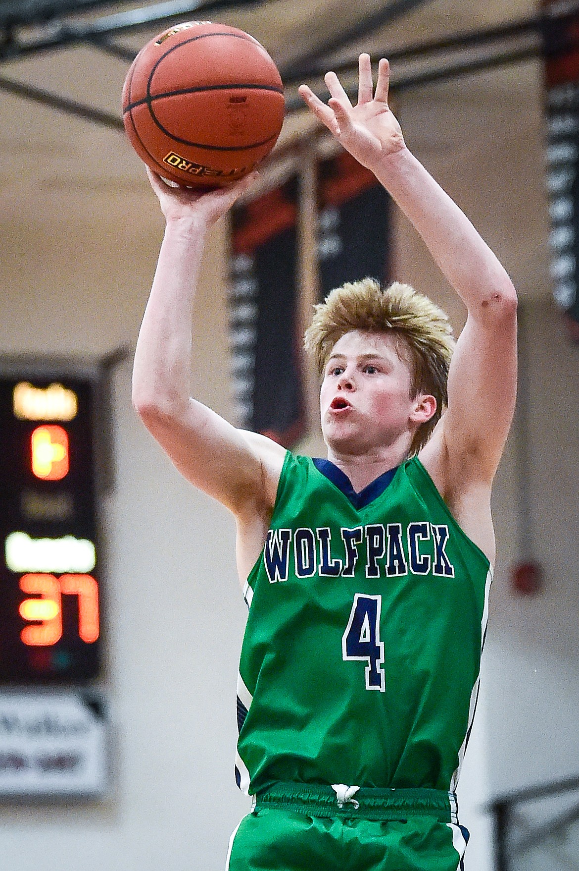 Glacier's Adam Nikunen (4) knocks down a jumper in the second half against Helena in the Western AA Divisional Tournament semifinal at Flathead High School on Friday, March 3. (Casey Kreider/Daily Inter Lake)