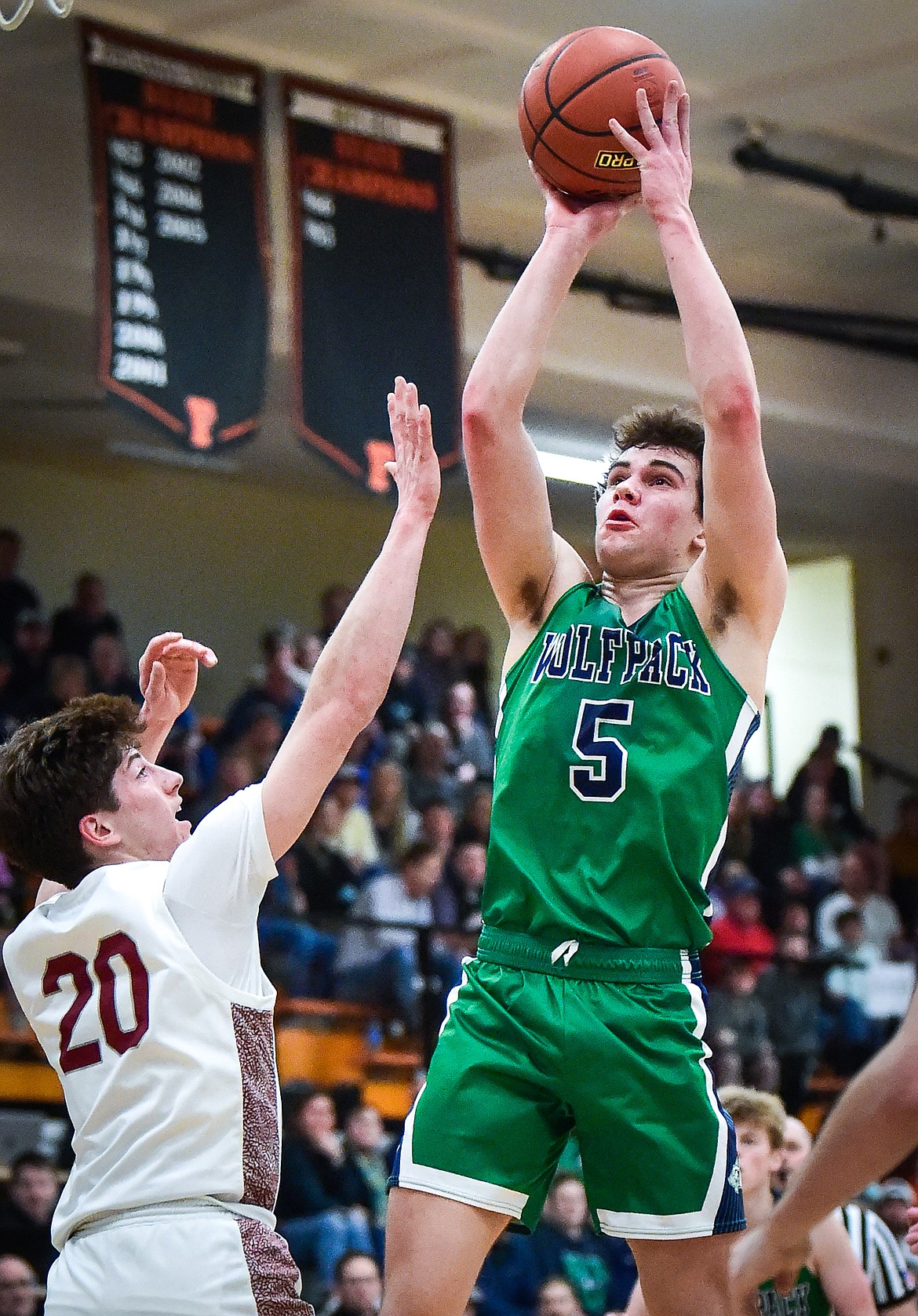 Glacier's Ty Olsen (5) rises for a jumper in the lane against Helena in the first half of the Western AA Divisional Tournament semifinal at Flathead High School on Friday, March 3. (Casey Kreider/Daily Inter Lake)