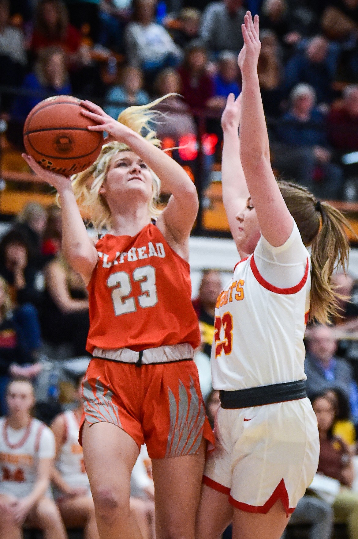 Flathead's Celie VandenBosch (23) goes to the basket in the first half against Missoula Hellgate in the Western AA Divisional Championship at Flathead High School on Saturday, March 4. (Casey Kreider/Daily Inter Lake)