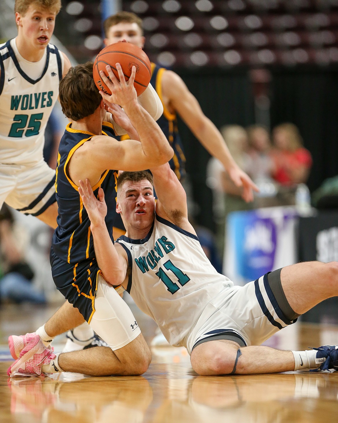 JASON DUCHOW PHOTOGRAPHY
Lake City High senior forward Zach Johnson battles for a loose ball during Saturday's state 5A championship game in Nampa.