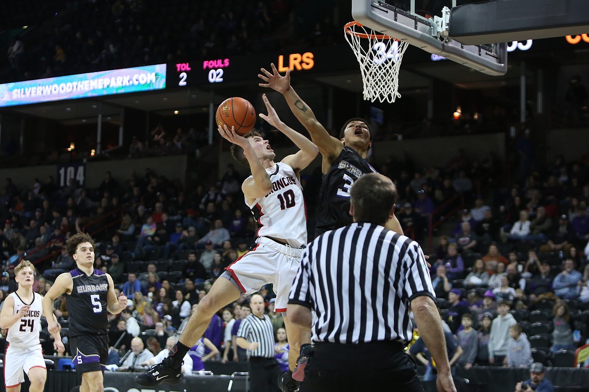 LRS sophomore Jayce Kelly gets fouled while attempting a shot from under the rim. Kelly made the shot and the ensuing free throw for a three-point play.