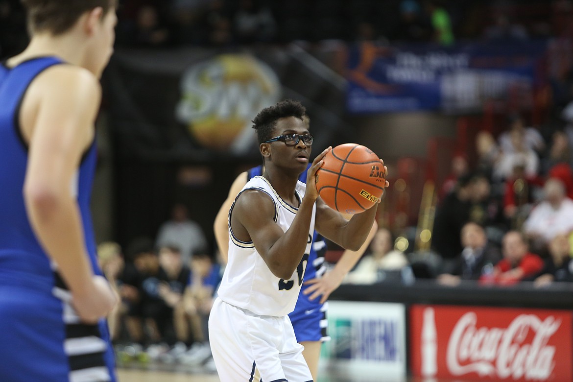 MLCA/CCS senior Jeff Boorman looks up at the basket while attempting a free throw.