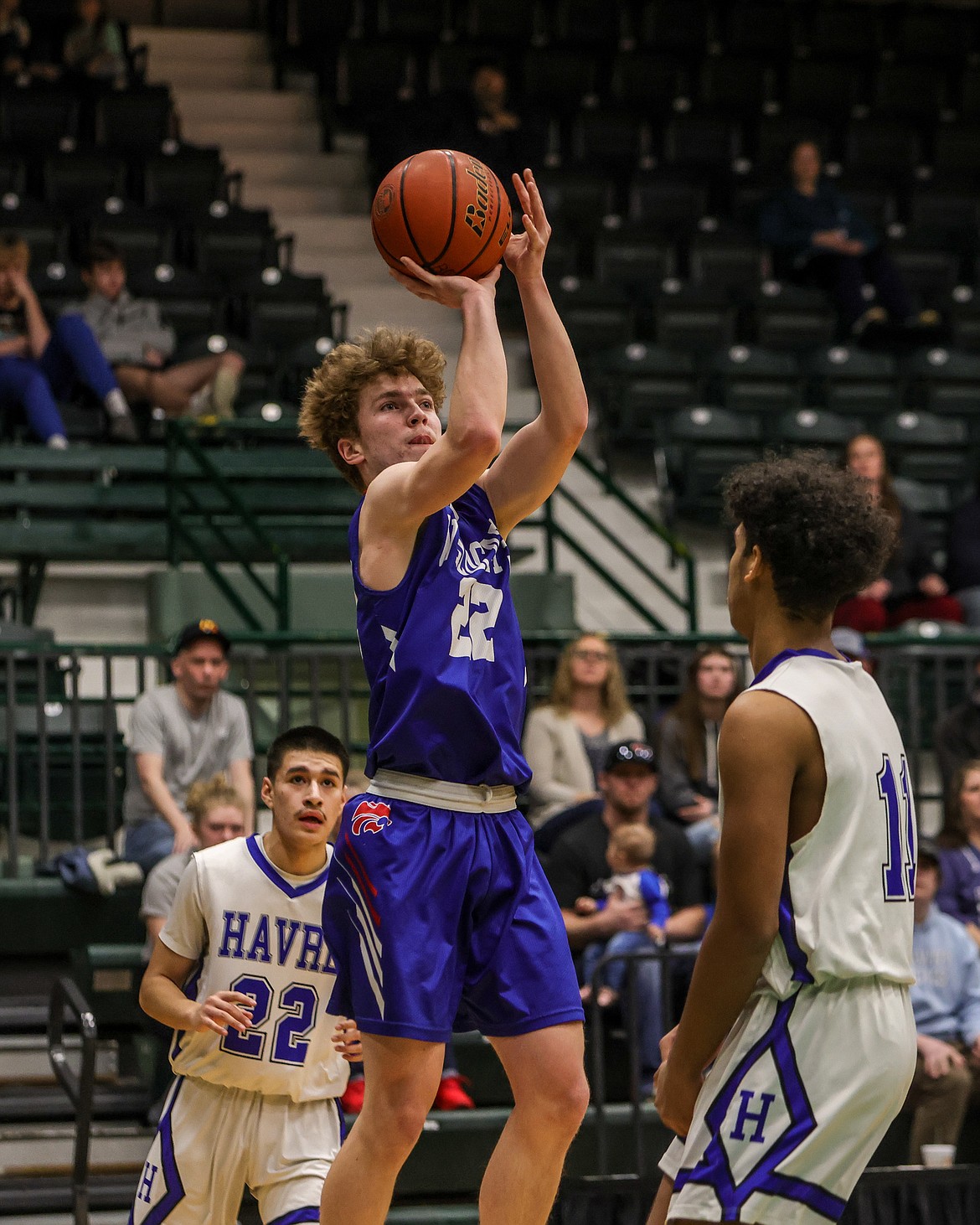 Columbia Falls guard Reggie Sapa (22) goes up for two in the Wildcats’ 82-74 overtime win against Havre Saturday, in a State A play-in game played at the Butte Civic Center. (JP Edge/Hungry Horse News)