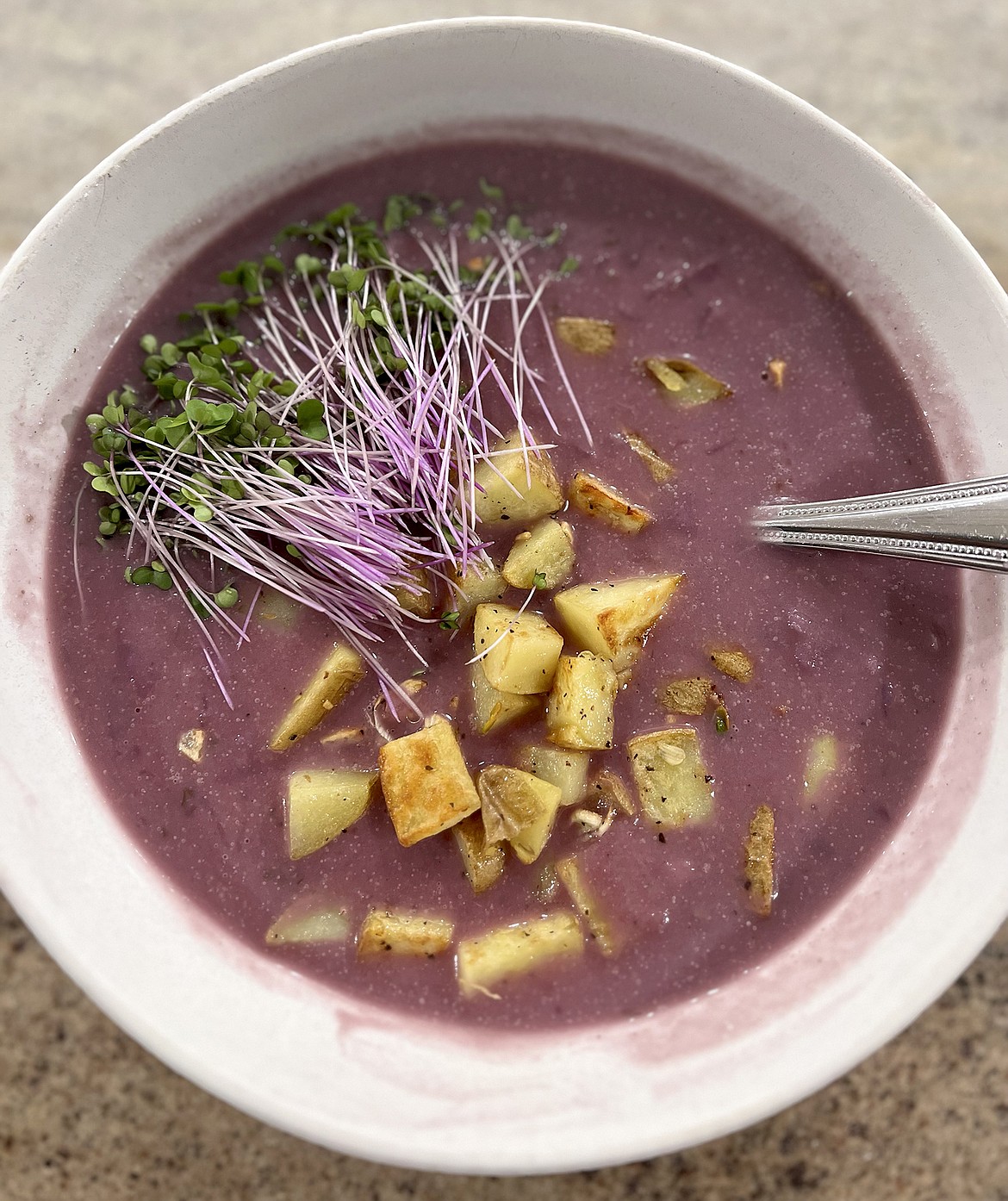 Chef Lohof's purple cabbage potato soup topped with kohlrabi micro greens from the local Gecko Farms. (Photo by Lohof)