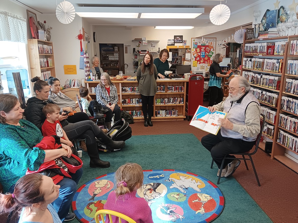 Dr. Suess wrote over 60 books enjoyed by children all over the world and the Mineral County Library in Superior hosted a birthday celebration in his honor last Thursday. Ron Anderson was one of the readers who read one of Dr. Seuss’s books before the refreshments were served. (Monte Turner/Mineral Independent)