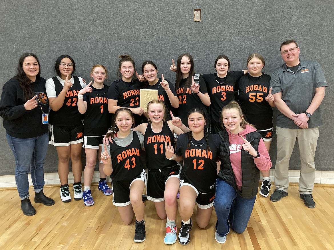 Ronan's eighth graders girls' basketball team won last week's 16-team tournament in Kalispell with a 44-35 victory, completing a two-year win-loss record of 25-1. The team includes (L-R, top): Eva Green, Jaid Camel, Lexi Sinclair, Zailee Hewankorn, Rayne Tonasket, Landyn Rosenbaum, Adrienne Crockett, Horizon Hammer and coach Cameron Marengo. Bottom row: Audrina Gopher, Kailyn Marengo, Haiyn Runsabove and Aubrey Kreil.