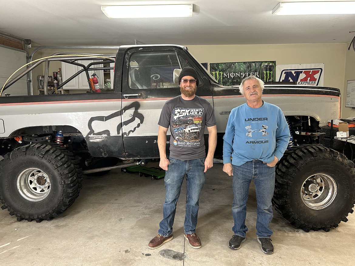 Sand Scorpions members Brandon Douglass and Rich Archer stand in front of Douglass’s custom-made rig. While it is not street-legal, it is just about ready for the upcoming season.