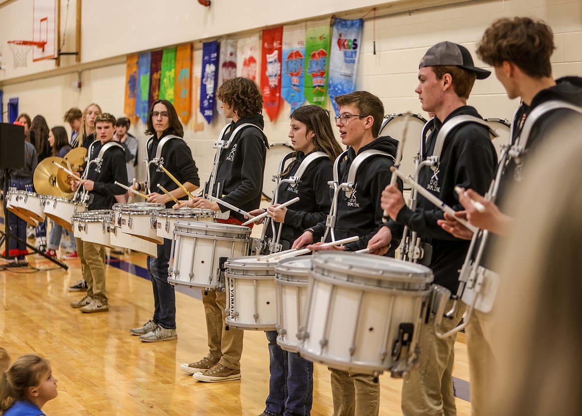 The Columbia Falls high school drum line performs last week at Ruder Elementary during Bleed Blue Week. (JP Edge photo)