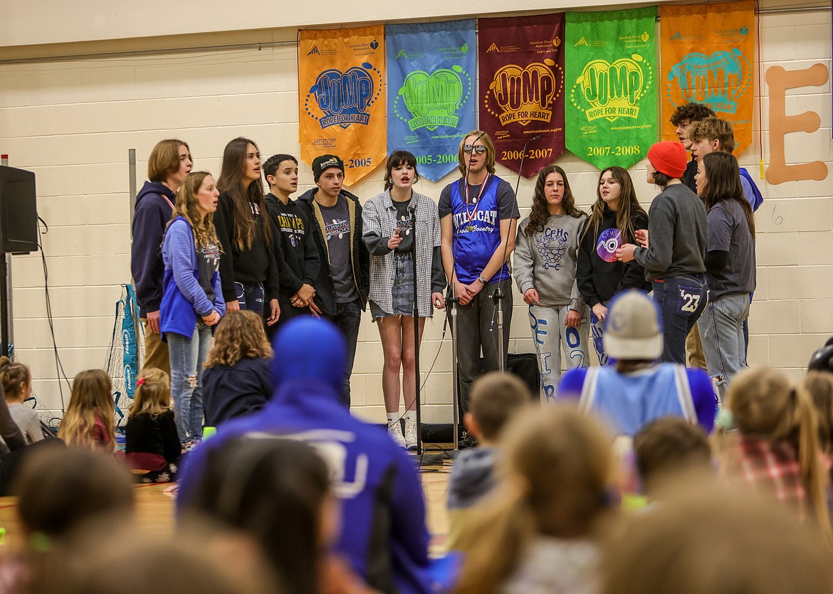 The high school choir performs at Ruder Elementary during Bleed Blue Week. (JP Edge photo)