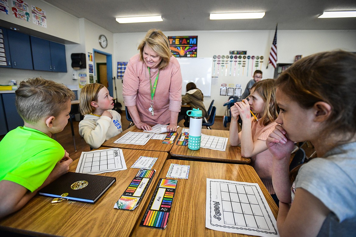Students participate in a lesson about fact and opinion-based statements in Donna Keel's fourth-grade classroom at Fair-Mont-Egan School on Tuesday, March 7. (Casey Kreider/Daily Inter Lake)