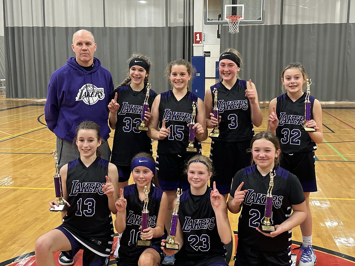 Courtesy photo
The Coeur d'Alene Lakers sixth grade girls went 4-0 to win the Hooptown Championship tournament in Spokane, beating LC Fusion 52-32 in the championship game. In the front row from left are Noelia Axton, Jaycee Bateman, Brynlee Johnston and Emmerson Cummings; and back row from left, coach Royce Johnston, Allie Jenkin, Savannah Stevens, Payton Brown and Greta Angle.