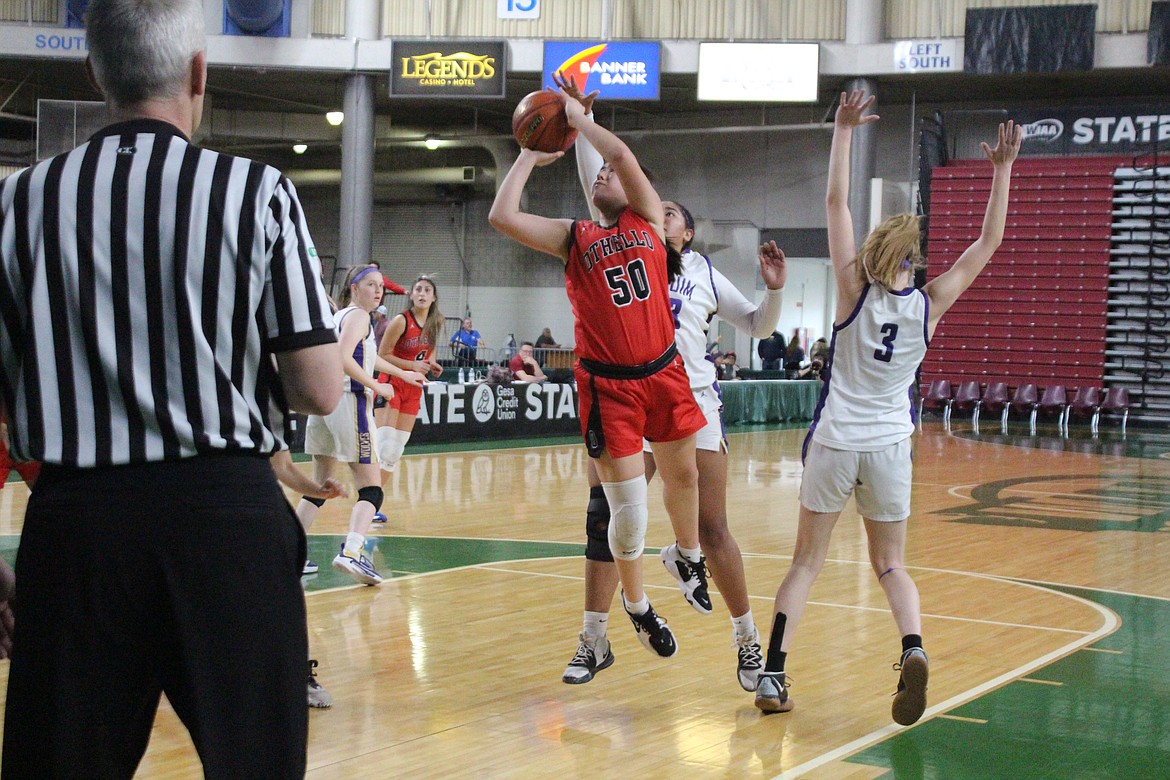 Emi Pruneda (50) goes up for the shot against Lynden.