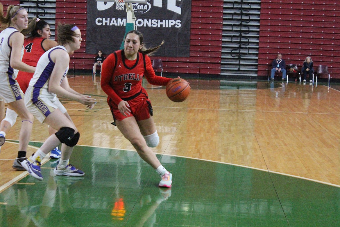 Briana Andrade (3) dribbles down the lane against the Sequim defense.