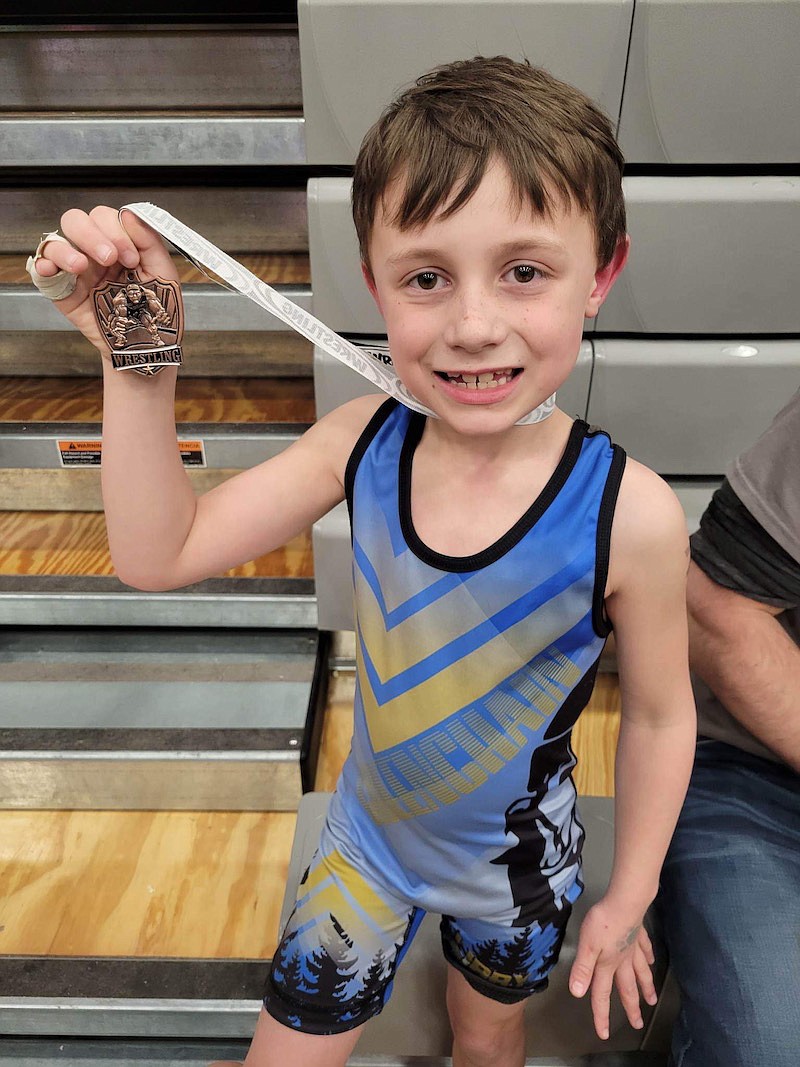Libby Wrestling Club's Hudson Mugford shows off his medal at last week's tournament.