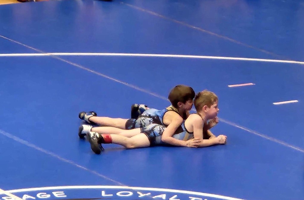 Libby Wrestling Club members Ruban Covey and Alexander Tsirigotis tangle during last week's tournament.