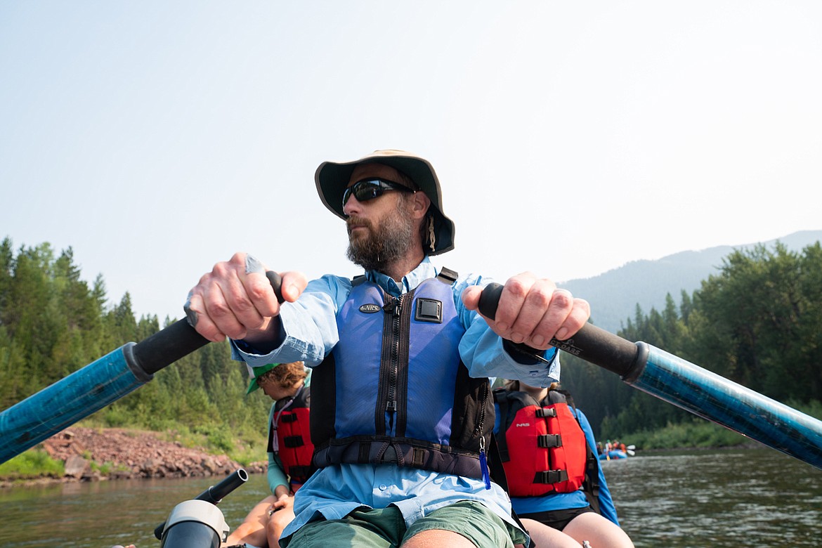 Bob Hall, a Flathead Biological Station stream ecology professor, leads students down the Middle Fork of the Flathead River during a summer stream ecology course. (UM News Service photo)