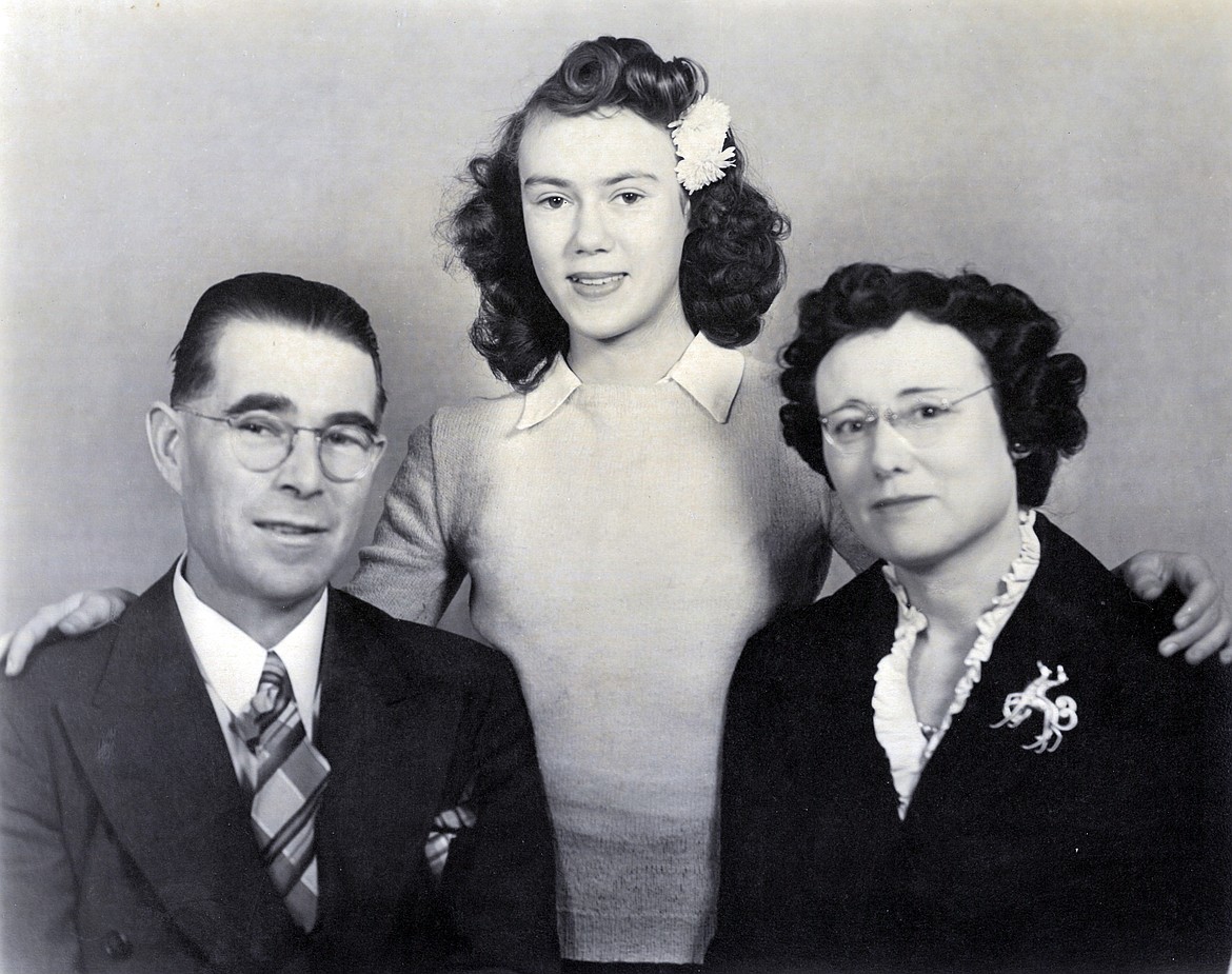 Valle Novak is pictured as a youth with her parents, Grant and Iva Riesland.