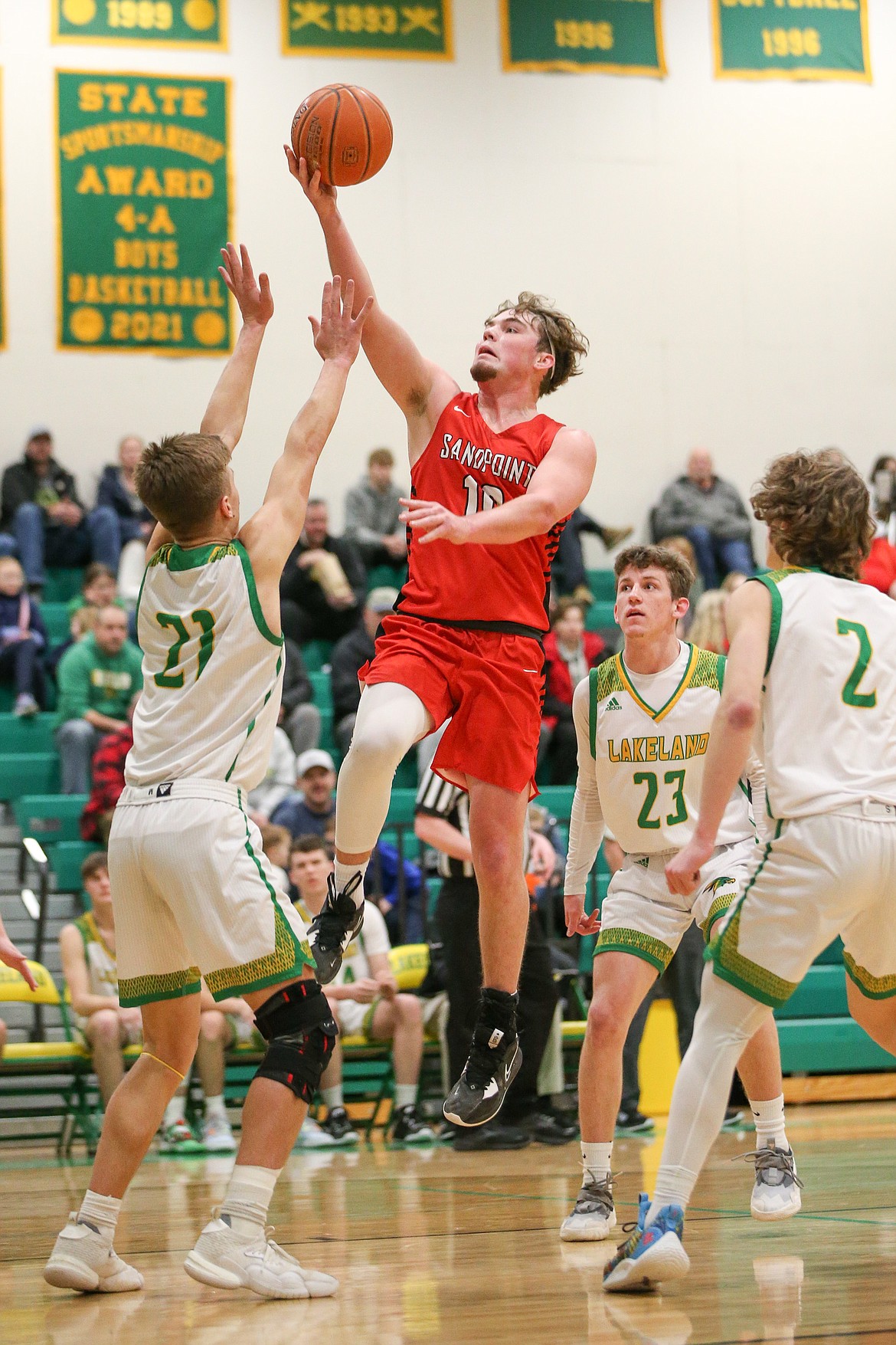 Arie VanDenBerg goes up for a layup earlier this season. The Sandpoint senior was among three players for the Bulldogs to be named to the all-Inland Empire League team.