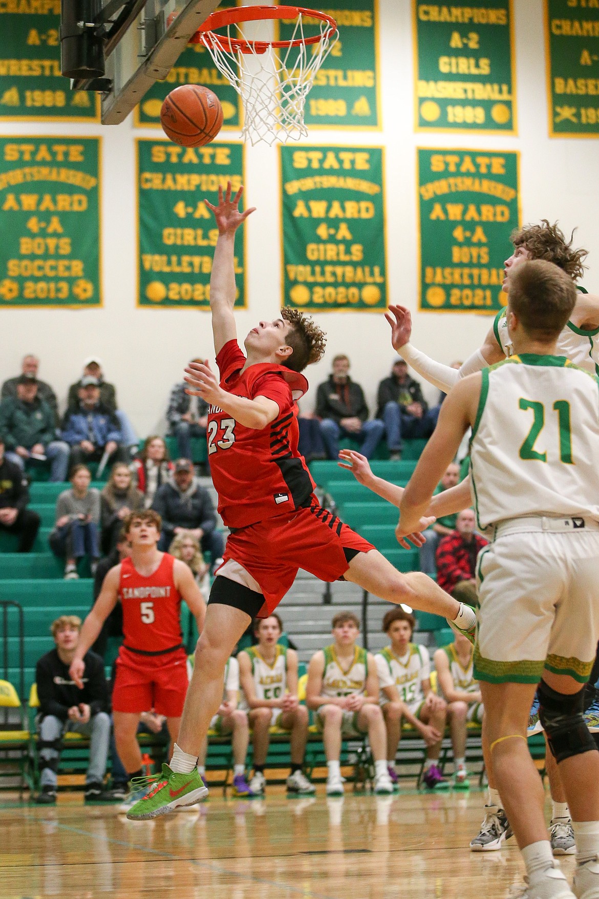 Parker Childs puts up a shot in a game earlier this season. The Sandpoint junior was one of three Bulldogs named to the all-Inland Empire League team.