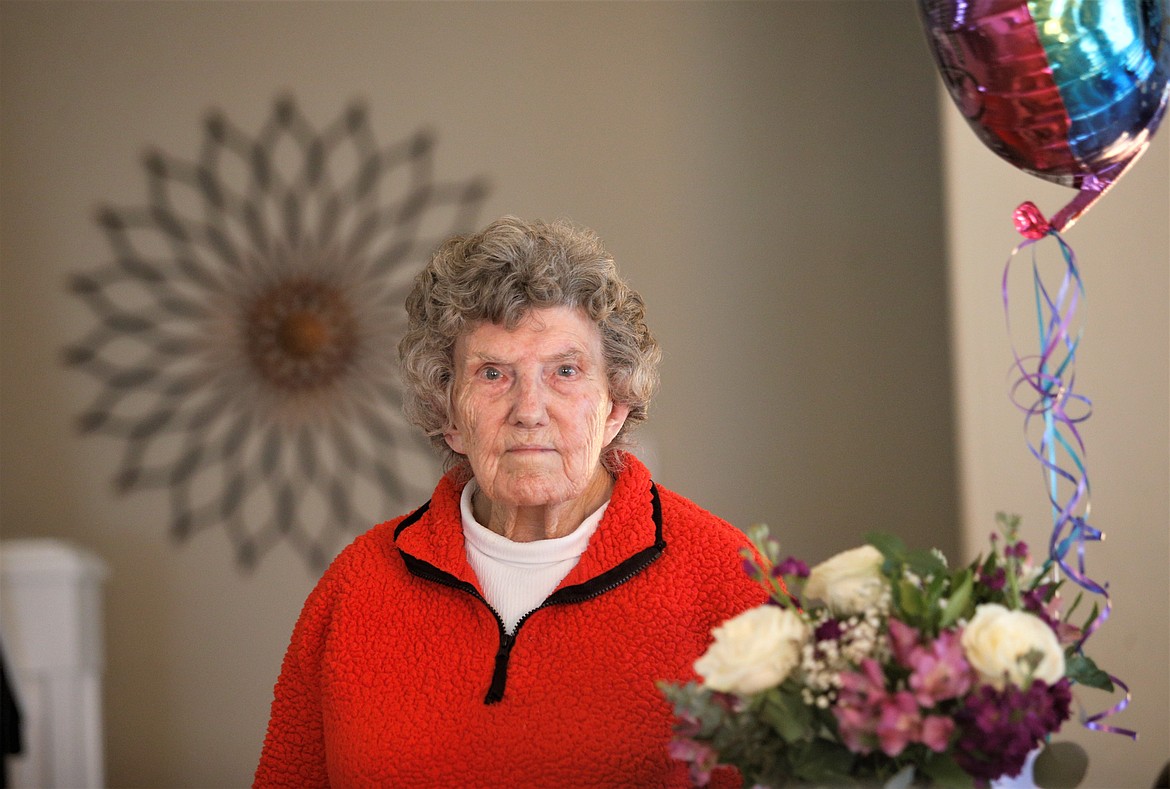Irene Pierce stands by her birthday balloon in her Coeur d'Alene home on Thursday.