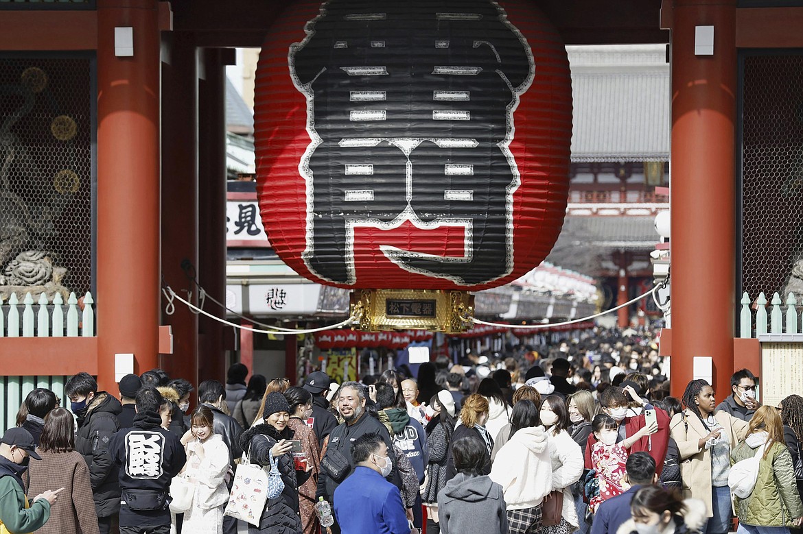 Tourists visit Asakusa area in Tokyo on Feb. 14, 2023. Japan’s economy grew at an annual pace of 0.1% in October-December, in a downgrade Thursday, March 9, 2023 from an earlier 0.6% increase, showing how the world’s third largest economy was barely eking out growth. (Kyodo News via AP)