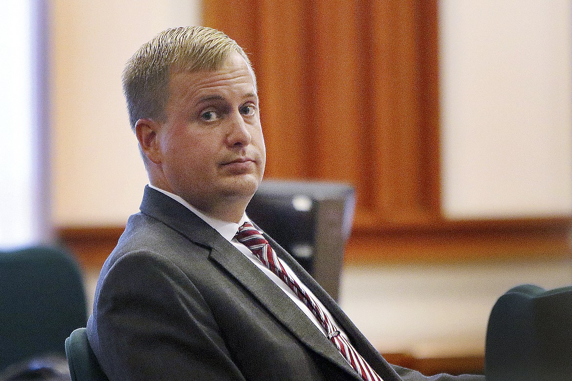 Former Idaho state Rep. Aaron von Ehlinger glances toward the gallery during his rape trial at the Ada County Courthouse on April 27, 2022, in Boise. A former legislative intern is suing von Ehlinger who was convicted of raping her and one of his colleagues for releasing her name and launching a harassment campaign.