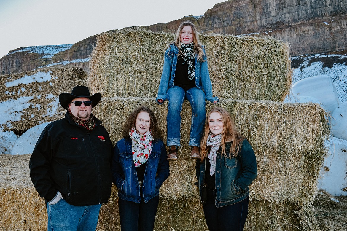 From left: Soap Lake rancher Darren Hinen with his daughters Savannah, Abby and Cassie.