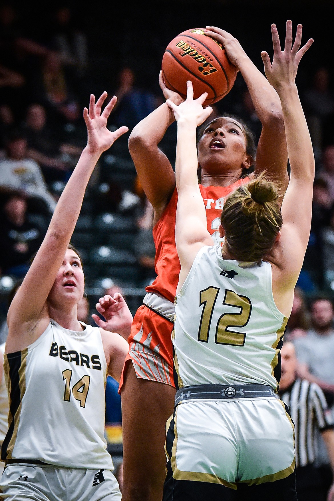 Flathead's Akilah Kubi (12) draws a foul as she shoots against Billings West in the first half of the girls' Class AA state basketball championship at the Butte Civic Center on Saturday, March 11. (Casey Kreider/Daily Inter Lake)