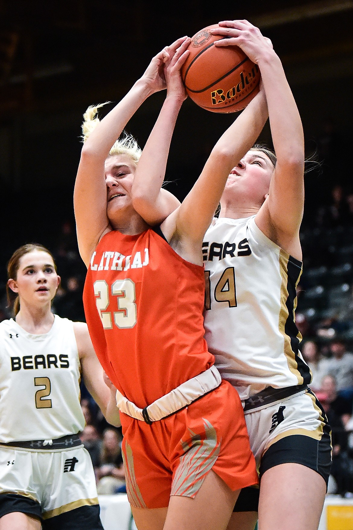 Flathead's Celie VandenBosch battles for a rebound with Billings West's Halle Haber (14) in the second half of the girls' Class AA state basketball championship at the Butte Civic Center on Saturday, March 11. (Casey Kreider/Daily Inter Lake)