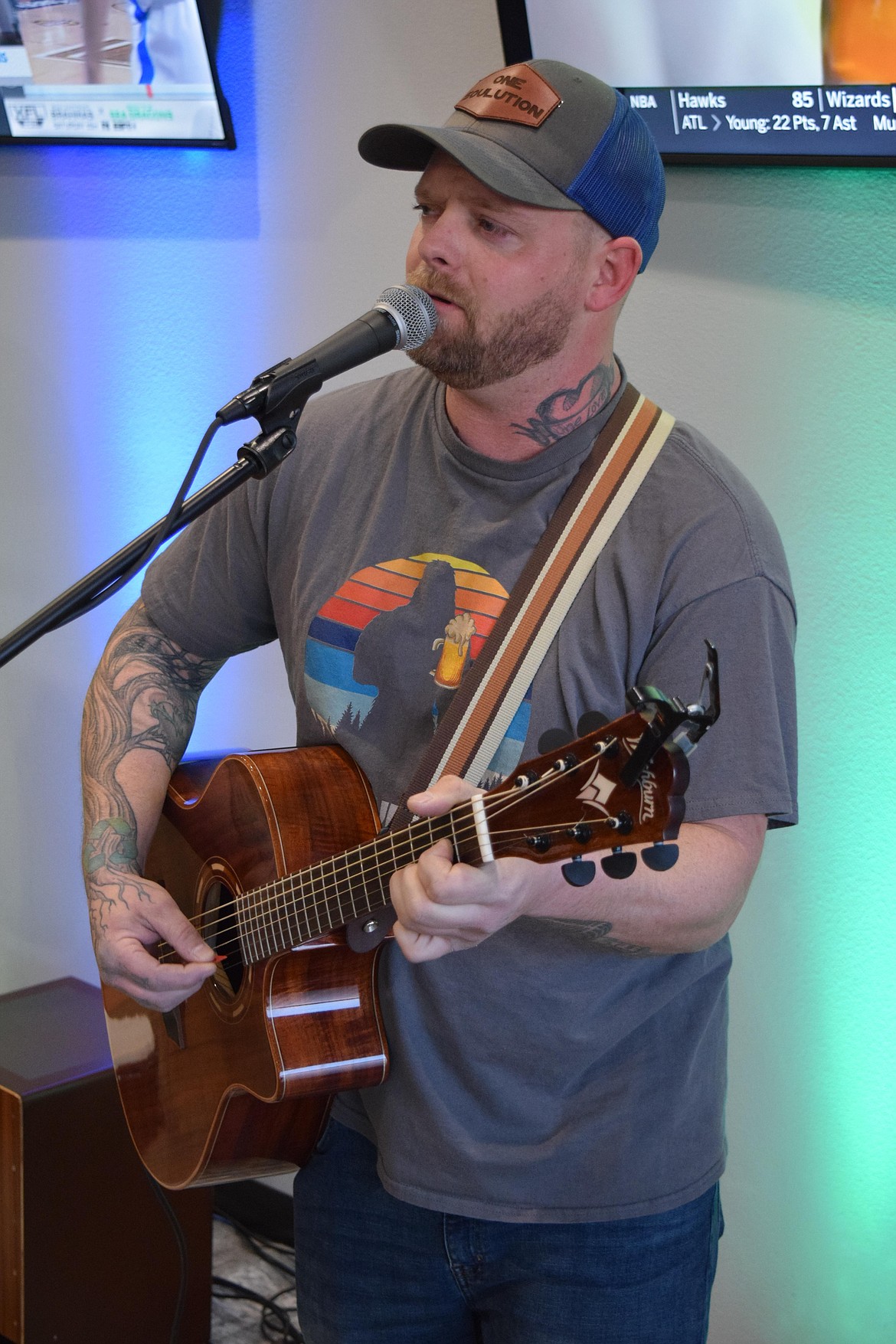 L.J. Polmateer of the local band One Solution warms up at the Moses Lake Taproom as he gets ready to perform.