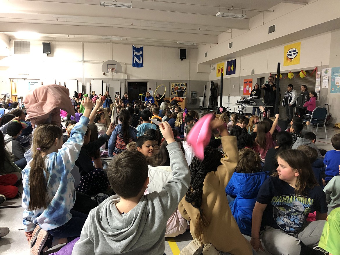 Ruploop's "Human Radio" performance at Larson Heights Elementary on March 10, 2023. The performers rapped about random objects students and staff would hold up. The performance is one of many put on by Columbia Basin Allied Arts in area schools.