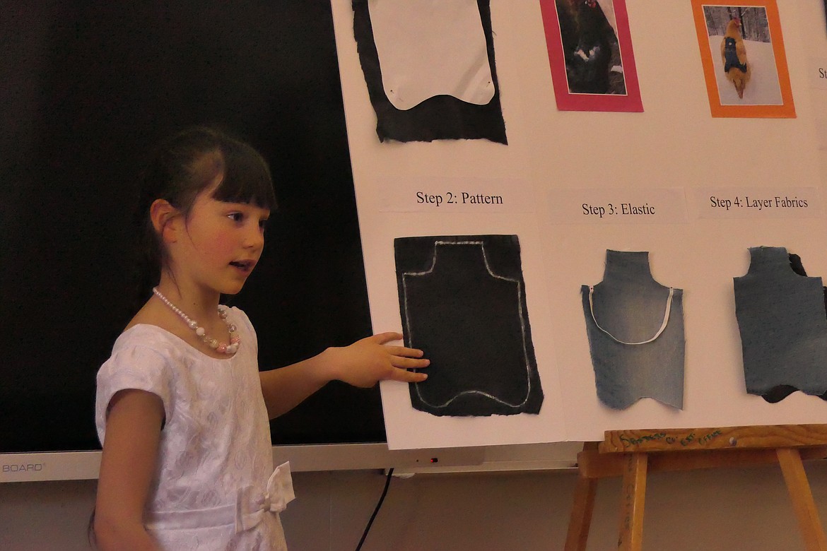 Junior category winner Ailie Avilla discusses how to make a "Chicken Saddle" during her presentation Sunday at the 4-H Communications event held at Plains High. (Chuck Bandel/VP-MI)