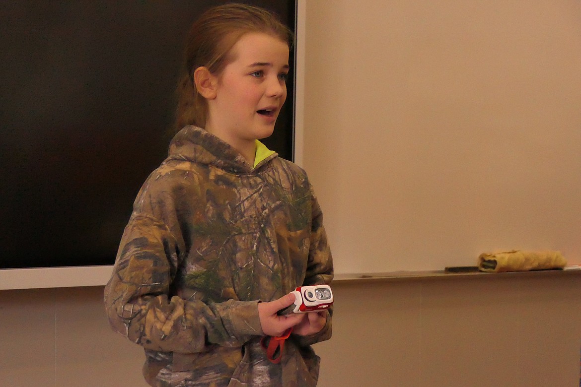 Moriah Champneys discusses the essentials of "taking a hike" in a safe and prepared manner during the 4-H communications event Sunday at Plains High School. (Chuck Bandel/VP-MI)