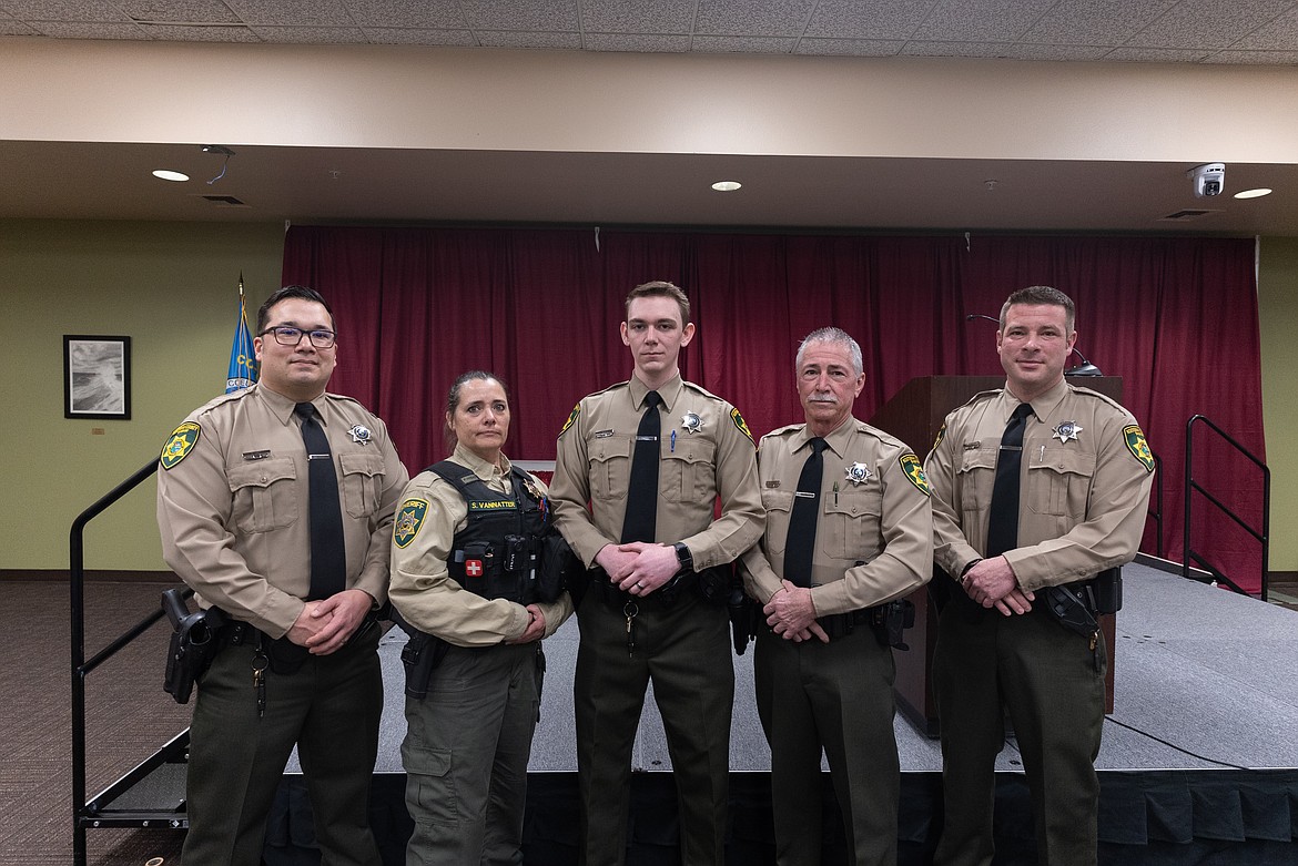 NIC Basic Detention Academy's first graduates pose for a photo at their commencement ceremony on Friday, March 10 in the Edminster Student Union Building on NIC’s main campus in Coeur d’Alene. Pictured, from left, are Aaron Hall of Corona, Calif., Shannon VanNatter of Bonners Ferry, Tyler Vasicek of Birmingham, Ala., Eugene Hibbard of Coeur d’Alene and Gavin Fairbanks of Coeur d’Alene.