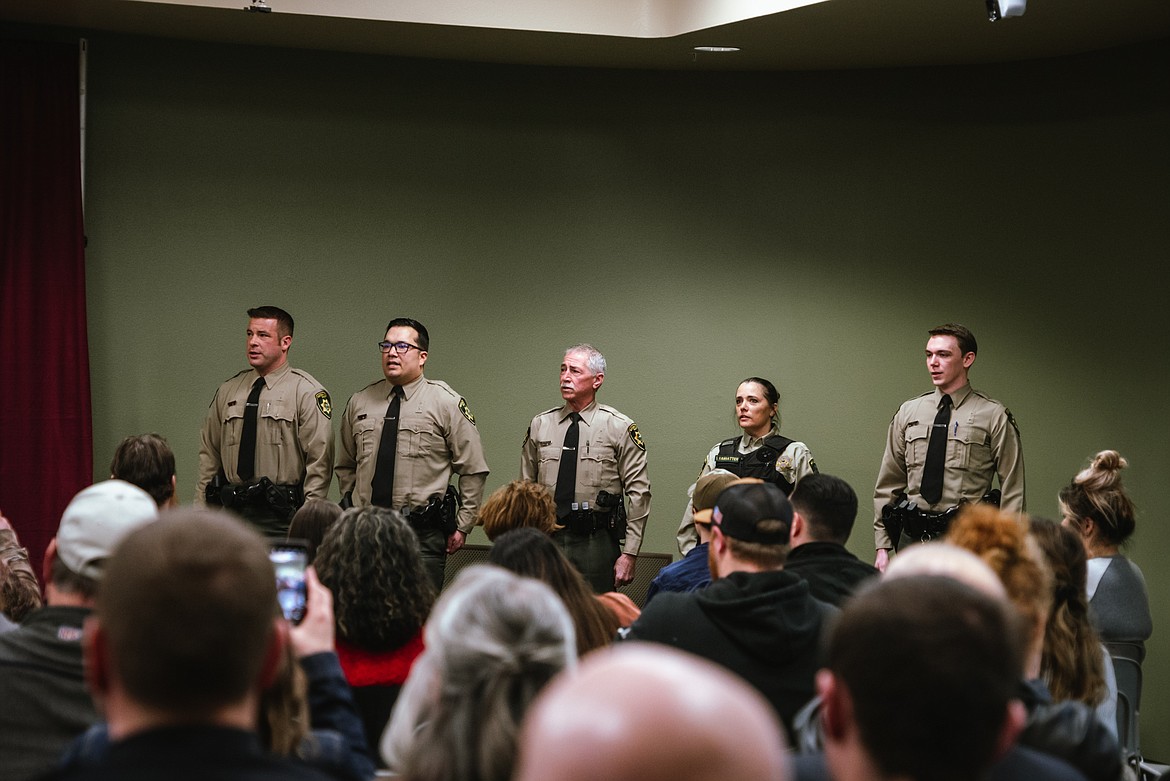 From left Gavin Fairbanks of Coeur d’Alene, Aaron Hall of Corona, Calif., Eugene Hibbard of Coeur d’Alene, Shannon VanNatter of Bonners Ferry and Tyler Vasicek of Birmingham, Ala. stand during NIC’s Basic Detention Academy graduation on Friday, March 10 in the Edminster Student Union Building on NIC’s main campus in Coeur d’Alene.