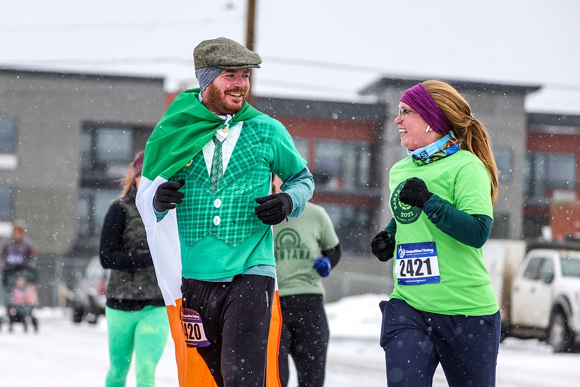 Patrick and Emily Johnston of Kalispell compete in the 5k at Cloverfest on Saturday. (JP Edge photo)