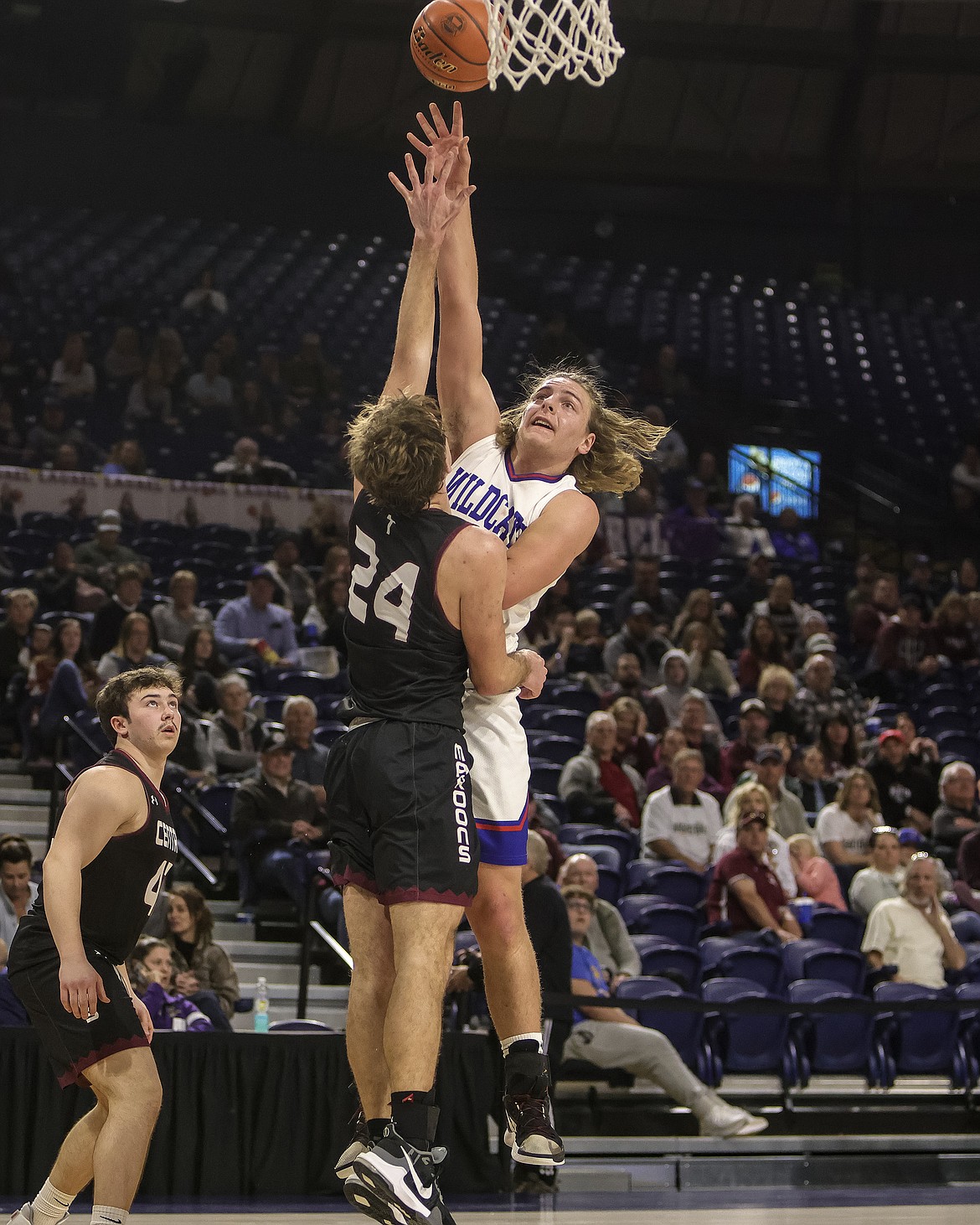 Cody Schweikert goes for a layup at State. (JP Edge photo)