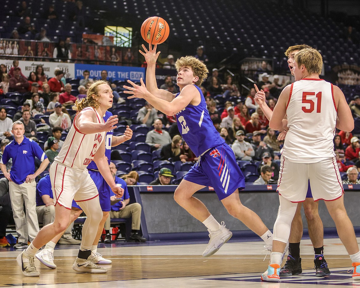 Junior Reggie Sapa goes for the basket on Friday in Bozeman. (JP Edge photo)