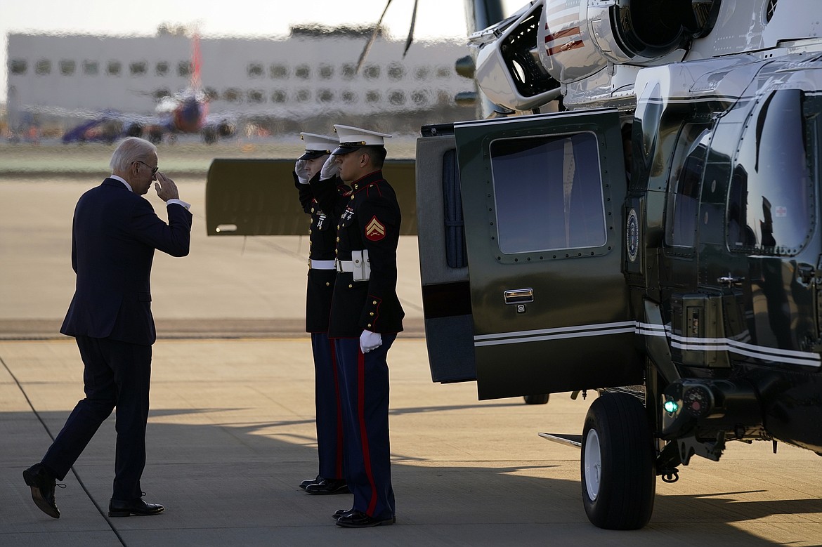 President Joe Biden boards Marine One at San Diego International Airport Monday, March 13, 2023, in San Diego. (AP Photo/Evan Vucci)